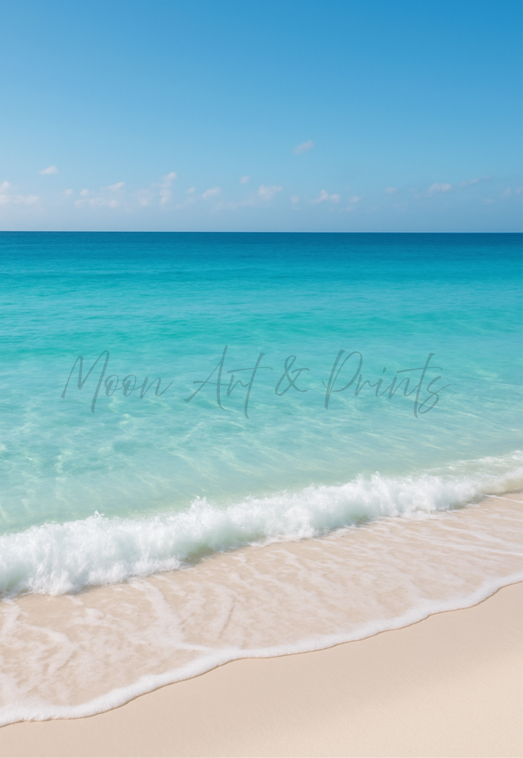 Photograph of a turquoise tropical ocean with gentle waves washing onto a soft white sandy beach under a clear blue sky.