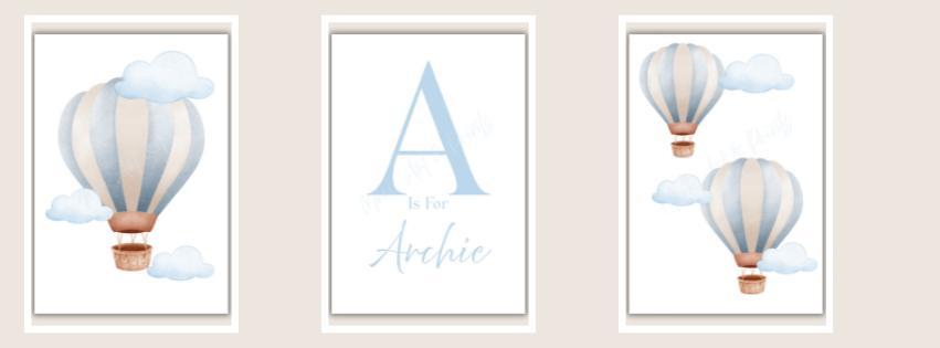 Three framed prints with hot air balloons and a letter 'A' on a beige background